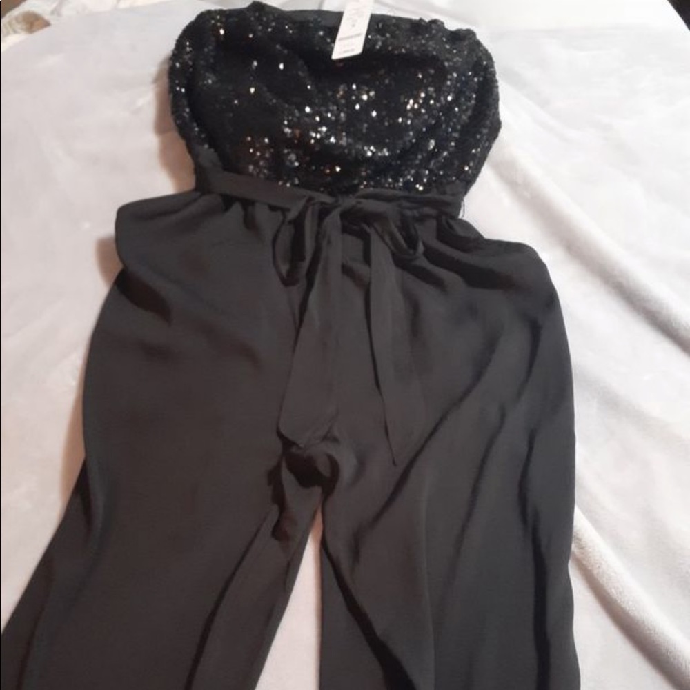 Bebe 2 pant suits size small Black with sequins